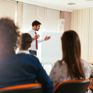 photo of a man giving a presentation